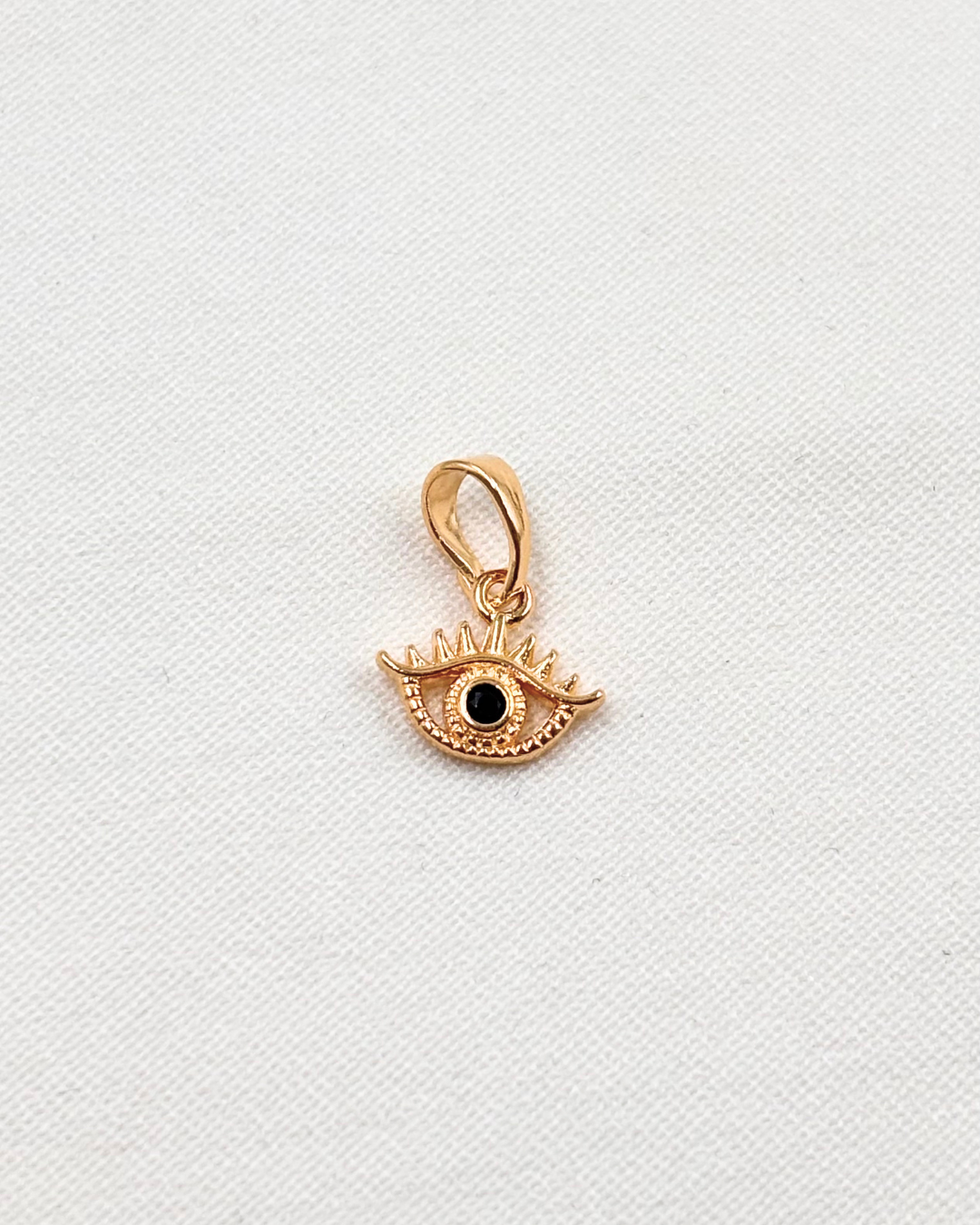 Dije Ojo Protector Circonia Negra - Oro Laminado