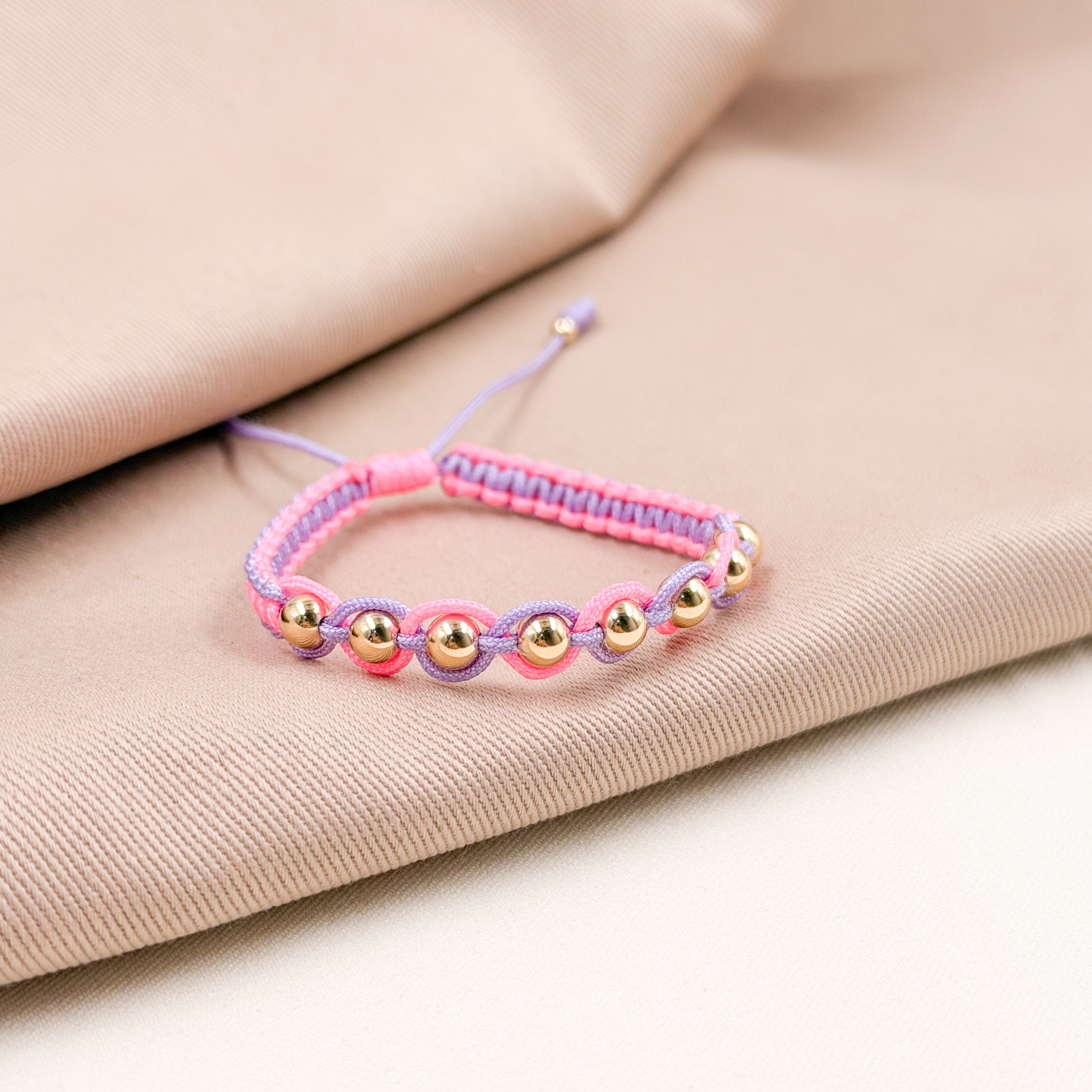 Pulsera Tejida Bicolor con Balines Lisos