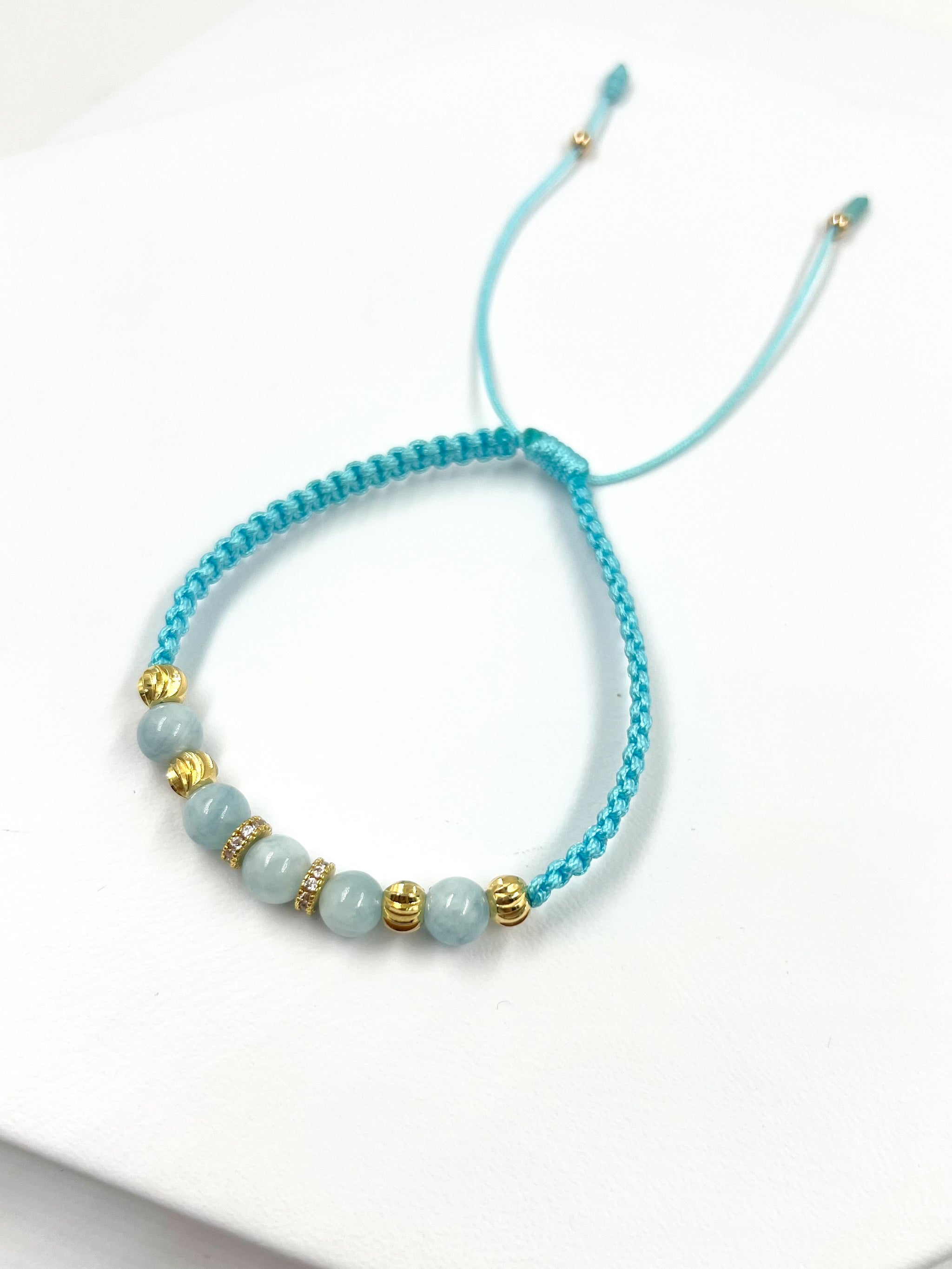 PUL220 Pulsera en oro laminado 18k. Y piedra semipreciosa agua marina